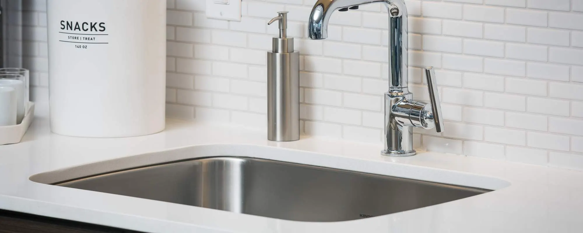Close up of the stainless-steel sink at Exhibit On Superior in Chicago, Illinois