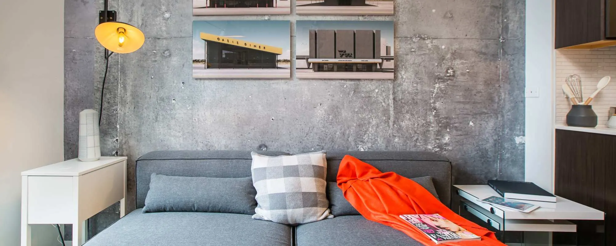 Couch and accent wall at Exhibit On Superior in Chicago, Illinois