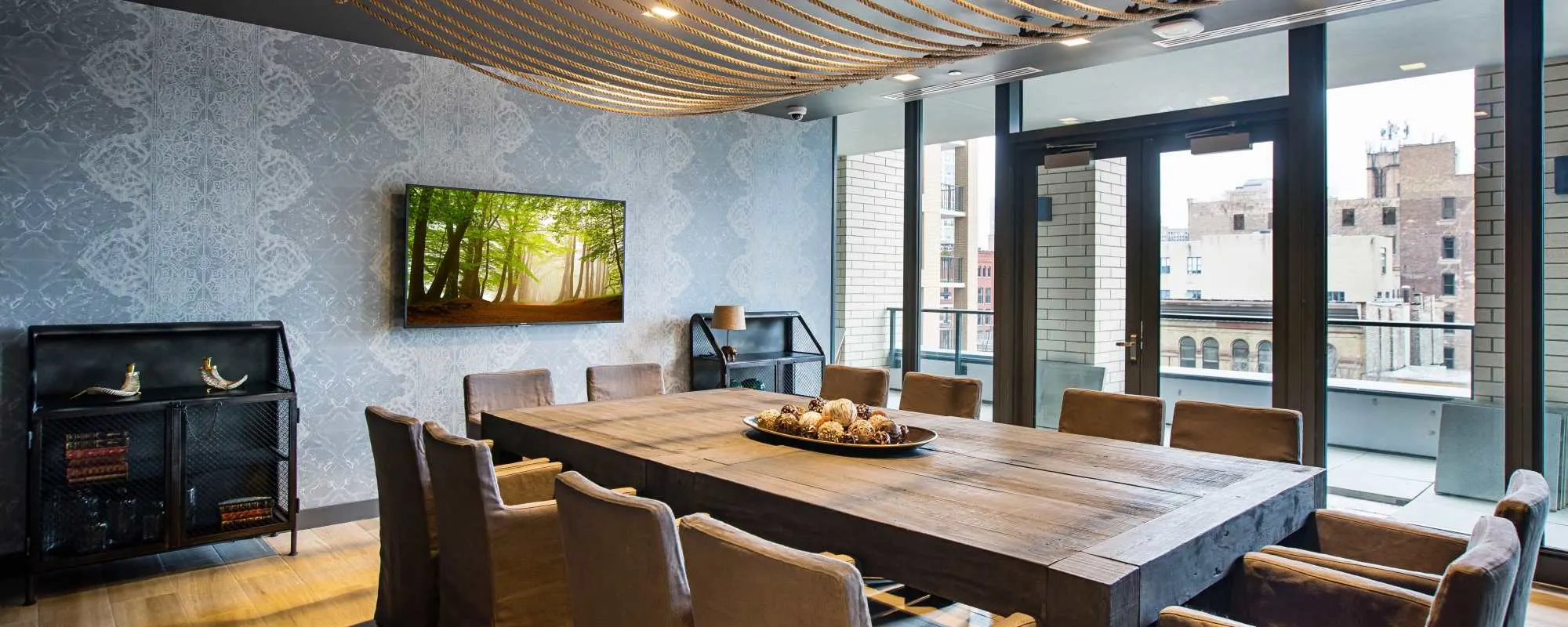 Meeting table in the lounge at Exhibit On Superior in Chicago, Illinois