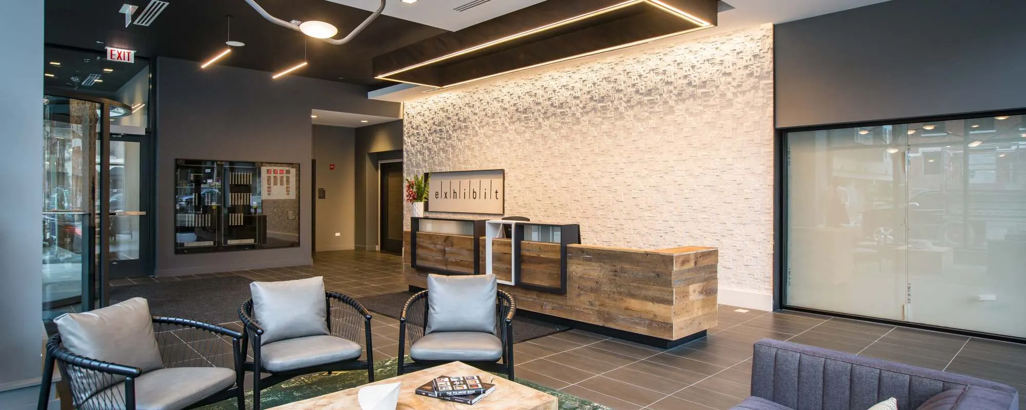 Spacious resident lounge at Exhibit On Superior in Chicago, Illinois